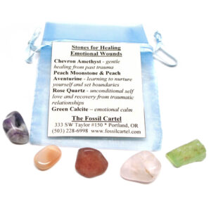A pouch for healing emotional wounds including tumbled amethyst, moonstone, aventurine, rose quartz, and calcite stones against a white background