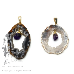 Agate geode slice pendants with amethyst crystals linked in the middle featuring gold plated bails against a white background