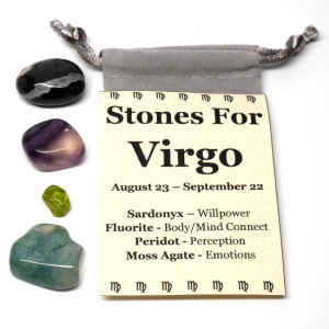 An astrological healing stone pouch for virgo featuring blue sardonyx, fluorite, peridot, and moss agate tumbled stones with a felt pouch against a white background