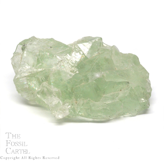 A light green translucent fluorite cluster from China against a white background