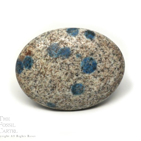 A K2 granite palm stone against a white background
