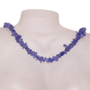 A tumbled tanzanite chip necklace against a white background