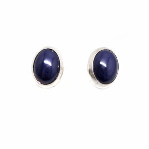 A pair of lapis lazuli sterling silver stud earrings against a white background