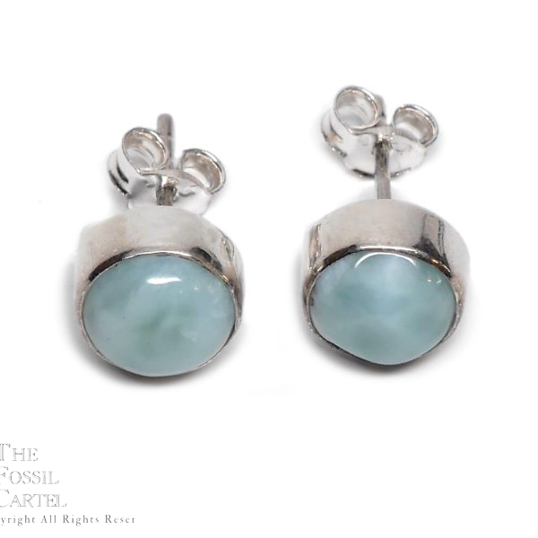 A pair of round sterling silver larimar stud earrings against a white background