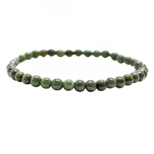 A beaded bracelet featuring dark green nephrite jade against a white background