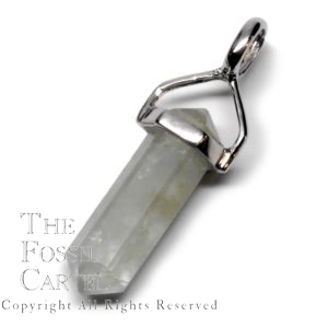 A simple crystal-shaped pendant made from a vogel cut aquamarine set in sterling silver against a white background.