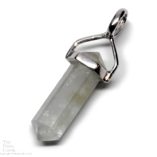 A simple crystal-shaped pendant made from a vogel cut aquamarine set in sterling silver against a white background.