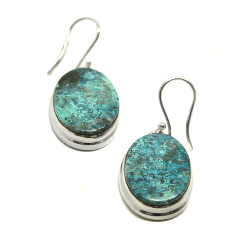 Shattuckite Sterling Silver Oval Earrings A pair of sterling silver dangle earrings featuring shattuckite cabochons against a white background