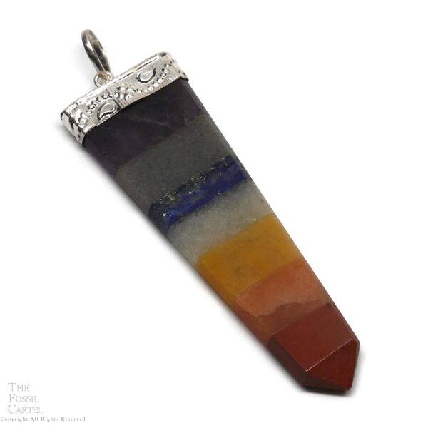 A simple capped crystal-shaped chakra pendant with seven different stones against a white background