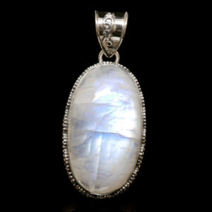 A sterling silver pendant featuring an oval rainbow moonstone cabochon against a black background