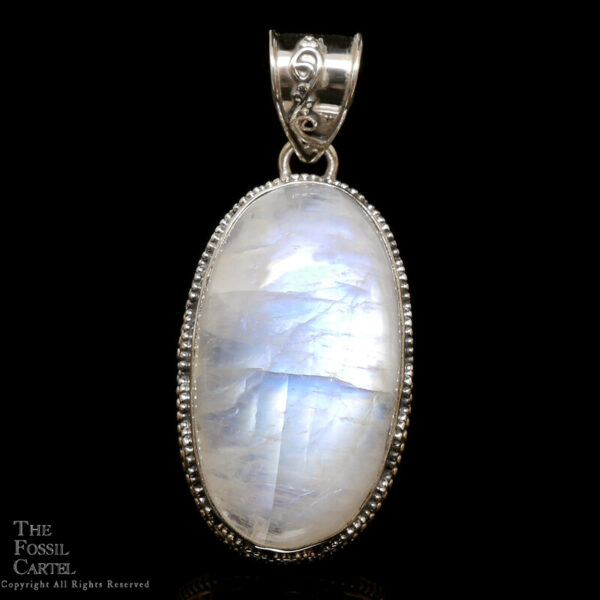 A sterling silver pendant featuring an oval rainbow moonstone cabochon against a black background