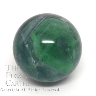 A rainbow fluorite sphere against a white background