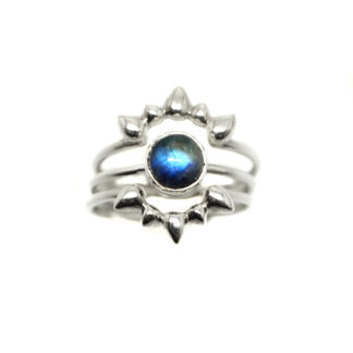 A set of rainbow moonstone stacker rings in sterling silver set against a white background