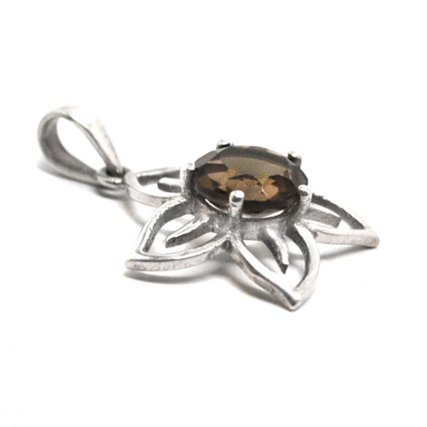 A sterling silver flower shaped pendant featuring a round-faceted smokey quartz gemstone against a white background