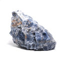 A rough blue calcite specimen against a white background