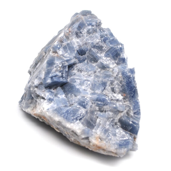 A rough blue calcite specimen against a white background