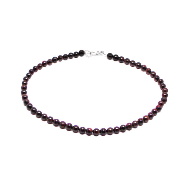 A beaded garnet necklace with a sterling silver S hook clasp against a white background