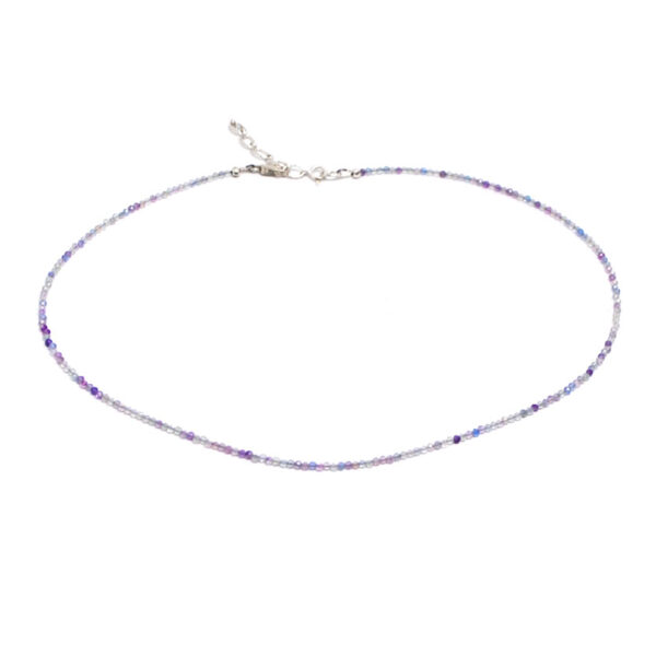 A fluorite microbead necklace against a white background