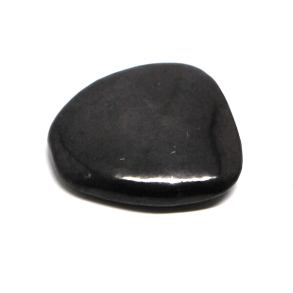 A black shungite soothing stone against a white background