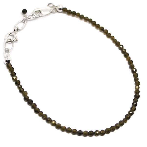 A gold sheen obsidian microbead bracelet against a white background