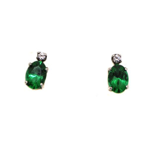 Emerald Obsidianite Oval Sterling Silver Stud Earrings with Cubic Zirconium accents against a white background