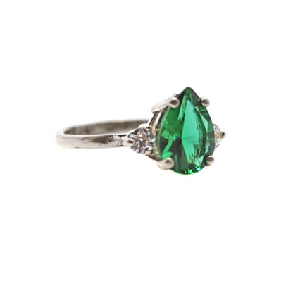 Emerald Obsidianite Pear Cut Sterling Silver Ring with Cubic Zirconium accents against a white background