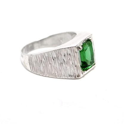 Emerald Obsidianite emerald cut Sterling Silver Ring with textured band against a white background