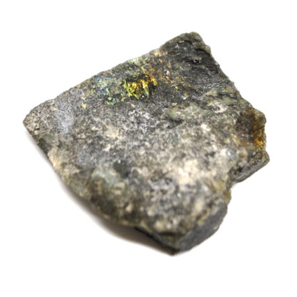 A piece of half polished labradorite with intense flashes of color against a white background