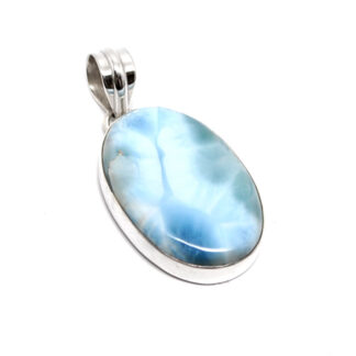 An oval larimar sterling silver pendant against a white background