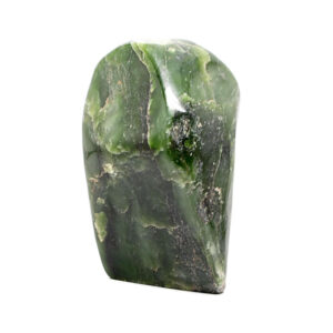 A polished free form nephrite jade specimen against a white background