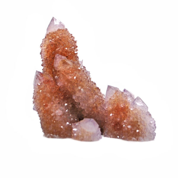 A spirit quartz crystal cluster against a white background