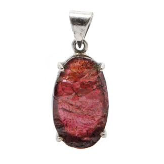 A sterling silver pendant prong-set with a rough garnet gemstone against a white background