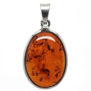 Amber Oval Sterling Silver Pendant against a white backround.
