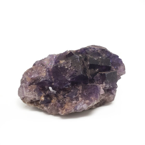 Medium Purple Fluorite Cluster against a white backround.