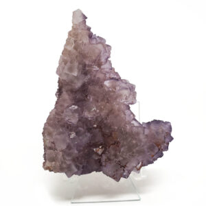 Large Purple Fluorite Cluster against a white backround.