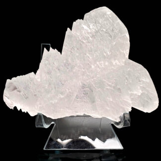 Selenite Angel Wings on a clear display stand against a black backround