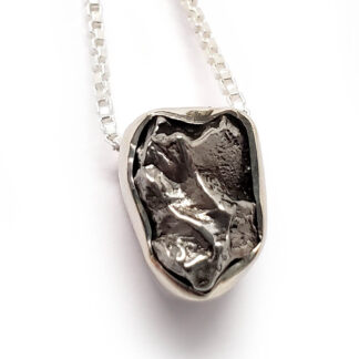 Meteorite Slider Pendant photographed against a white background