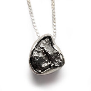Meteorite Slider Pendant photographed against a white background