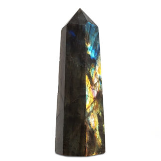 Labradorite Tower photographed against a white background