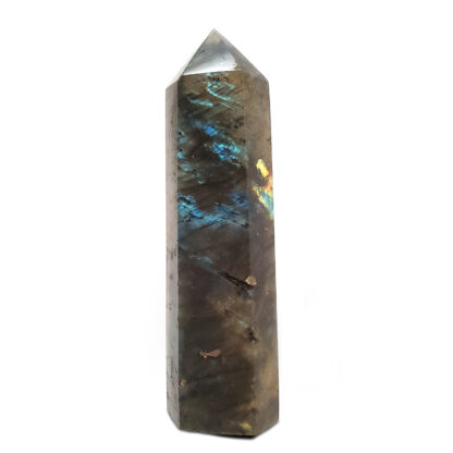 Labradorite Tower photographed against a white background