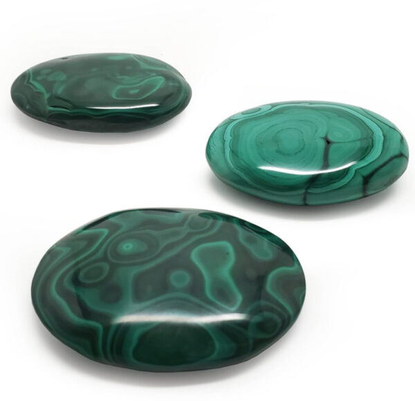 Three Malachite Palmstones against a white background, each sold separately
