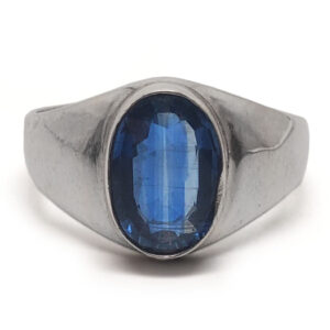 Kyanite ring photographed against a white background